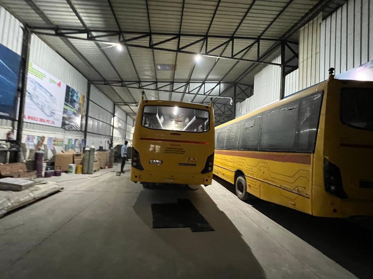 Two buses inside the Hedo Air Conditioning workshop, Edappally, Kochi